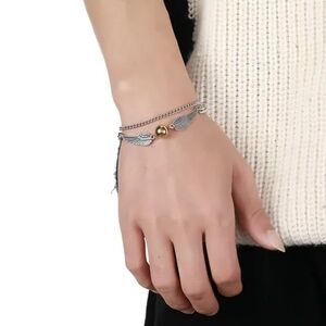 Elegant Silver and Gold Wing Bracelet